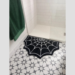 Tapis de salle de bain araignée